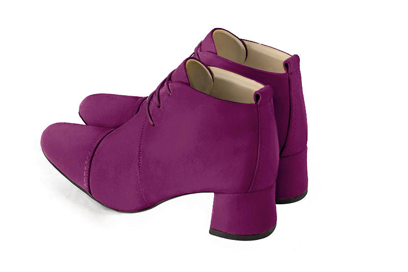 Mulberry purple women's ankle boots with laces at the front. Round toe. Low flare heels. Rear view - Florence KOOIJMAN